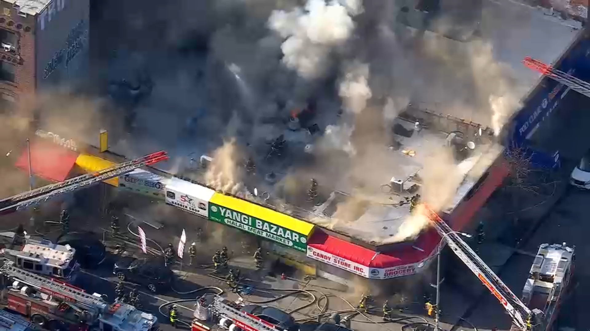 Fire tears through building housing row of businesses in Midwood, Brooklyn<br><br>