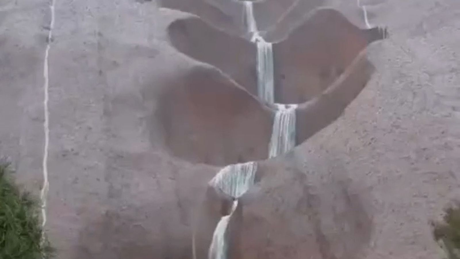 Waterfall forms on Australia's Uluru