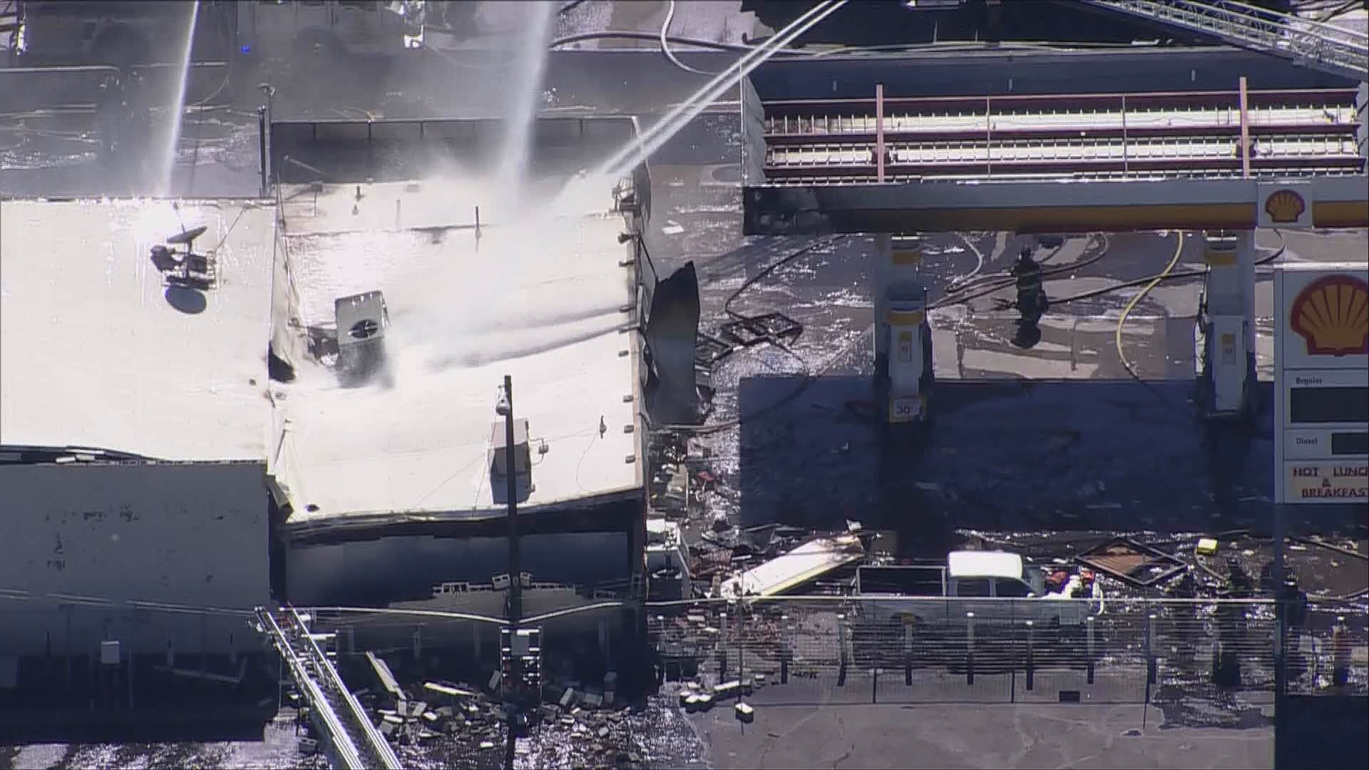 Aerial view shows aftermath of explosion at Denver gas station