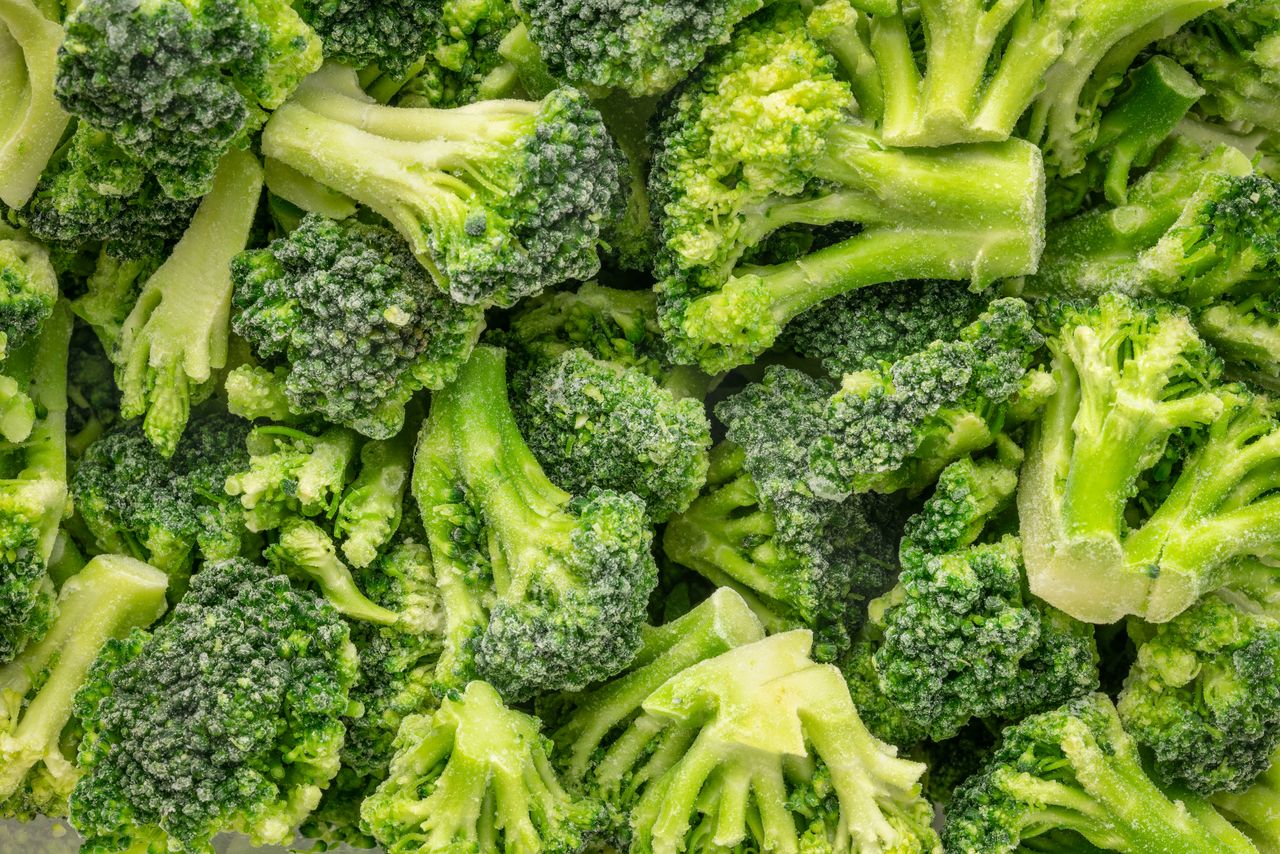 Frozen broccoli florets closely arranged