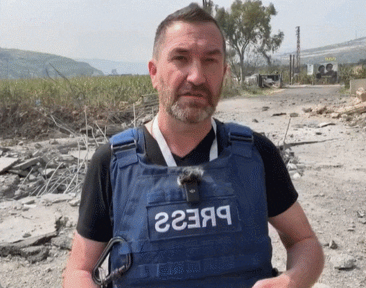 Israeli shell explodes near journalist during live report