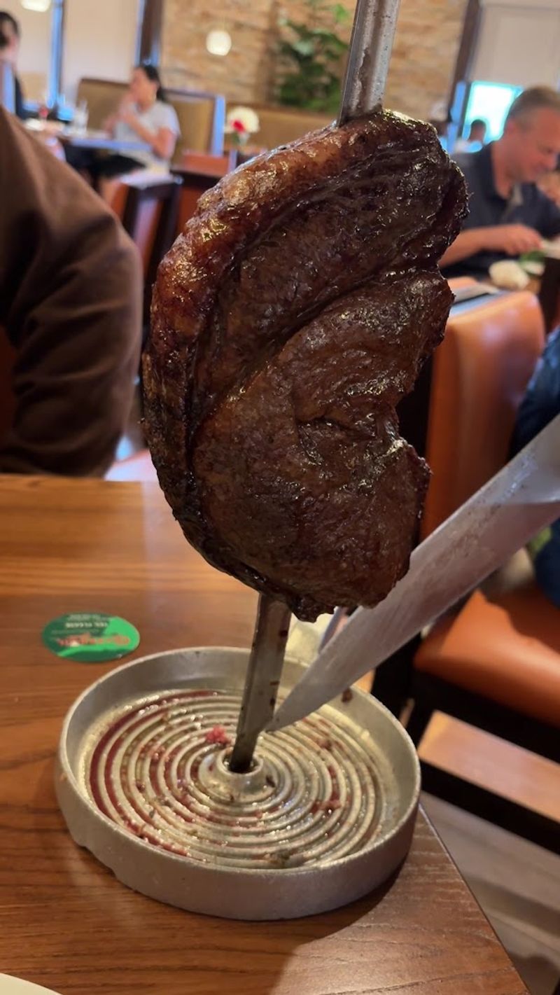An electric Virginia Brazilian steakhouse gem with a massive spread of ...
