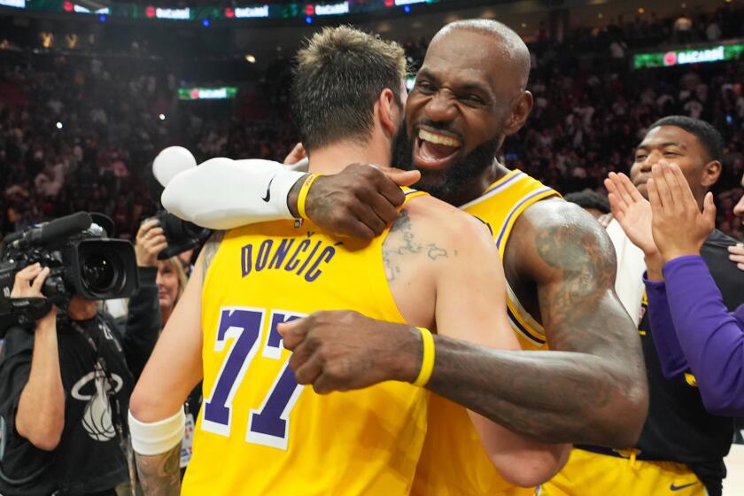 Luka Doncic scores 60 and LeBron ties NBA games record in Lakers ...