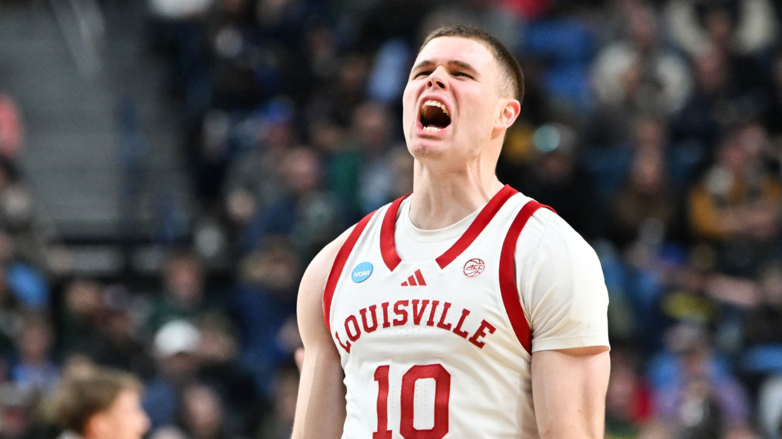 Louisville survives USF comeback bid in March Madness first round