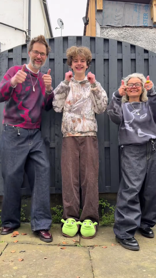 Fashionable parents styling baggy jeans and knits effortlessly