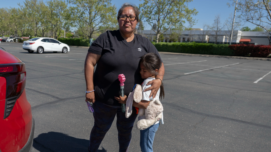 A parent is separated and re-united during Twin Rivers School District strike<br>