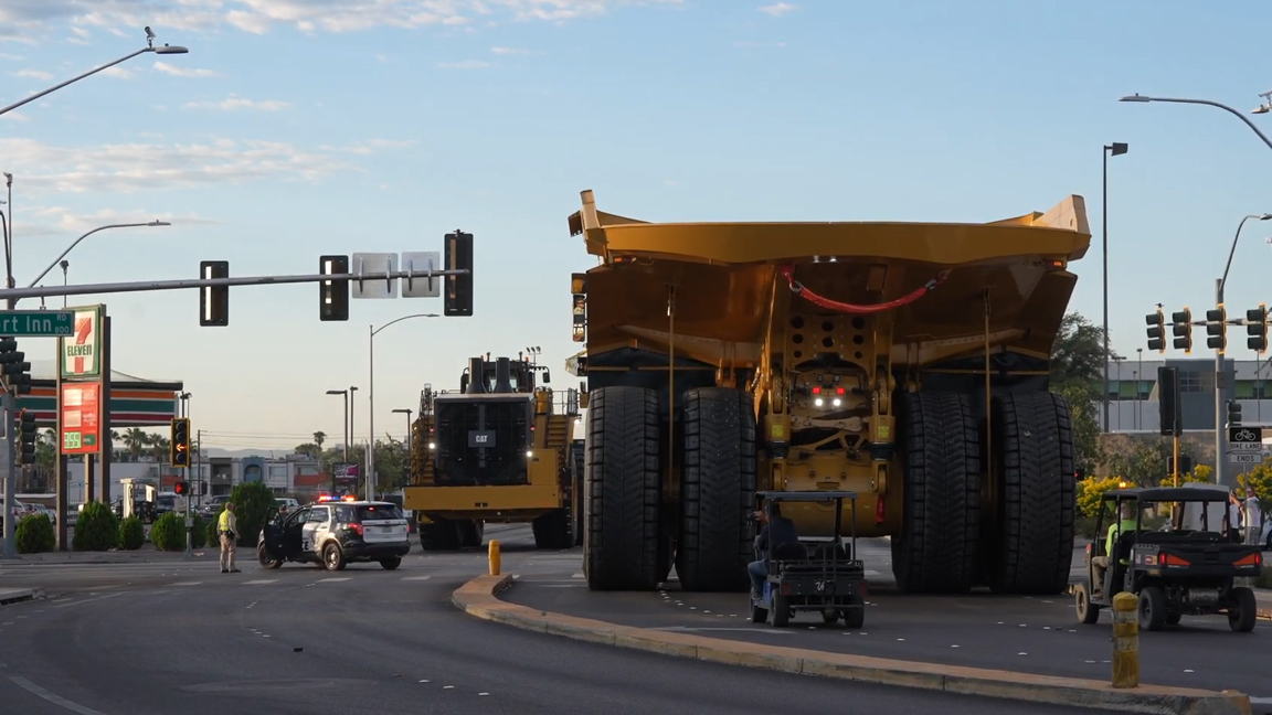 Massive mining machines make their way on highways