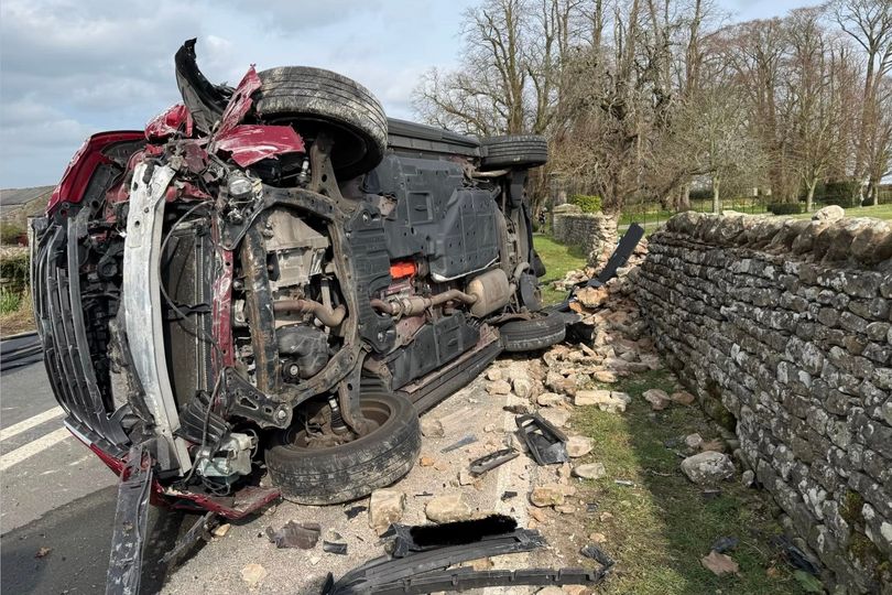 Van wrecked and wall smashed in dramatic crash as drivers face delays