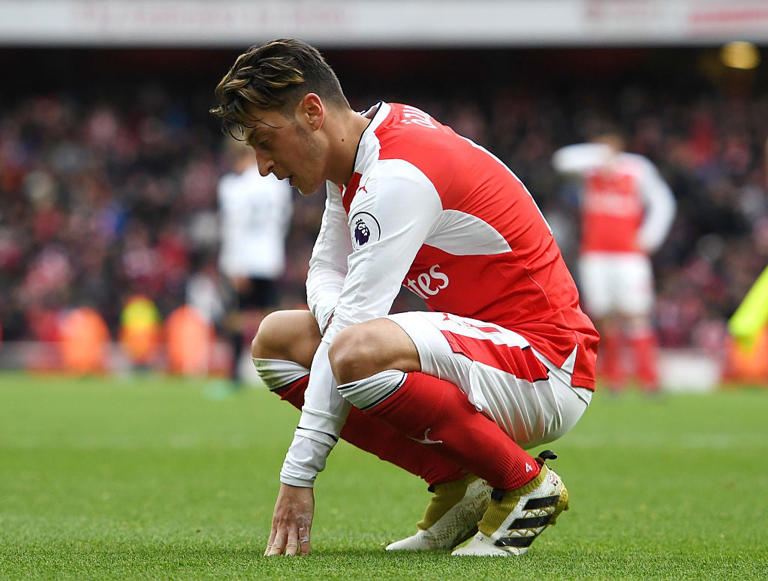 Mesut Ozil finished the season on 19 assists, one short of Henry’s record (Getty)