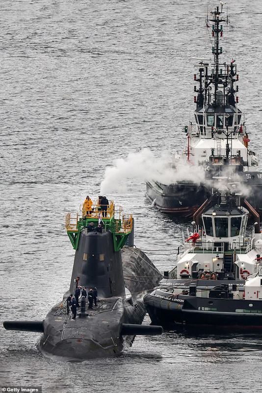 The Faslane base is the Royal Navy's headquarters in Scotland and hosts Britain's nuclear submarines including the Vanguard vessels armed with Trident missiles