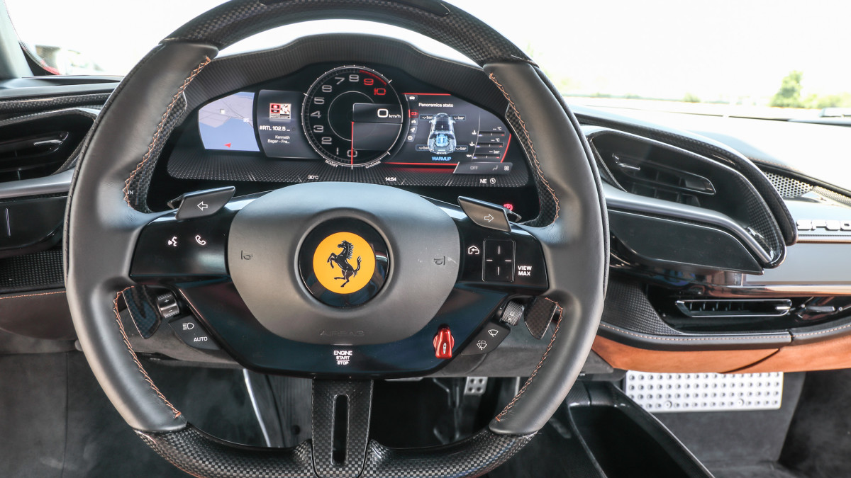 Ferrari boss explains why touchscreens took over cars—and why buttons ...
