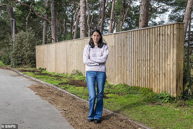 Couple must tear down 6ft garden fence outside their £1.15m home after officials rule it ugly
