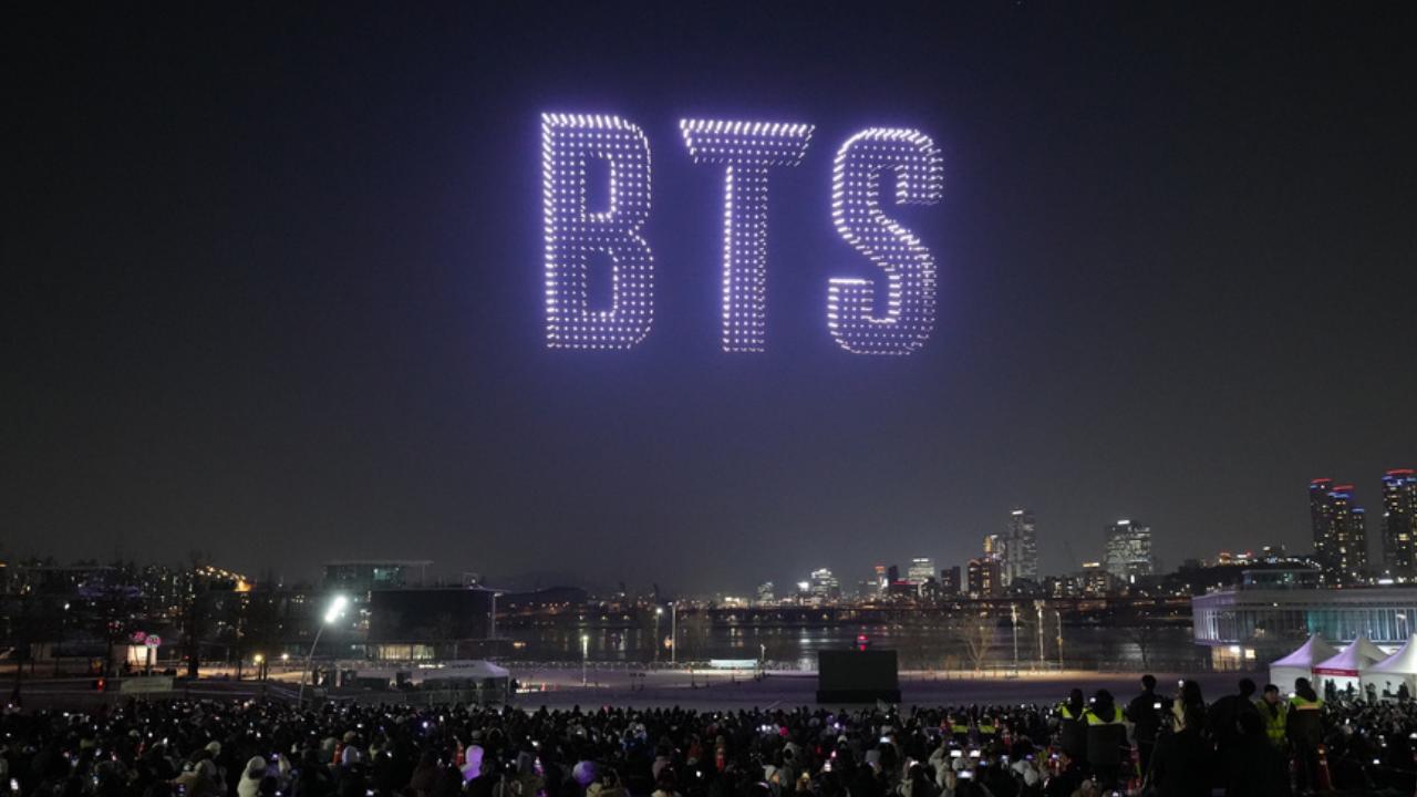 The faces of BTS light up night sky in Seoul, in drone display