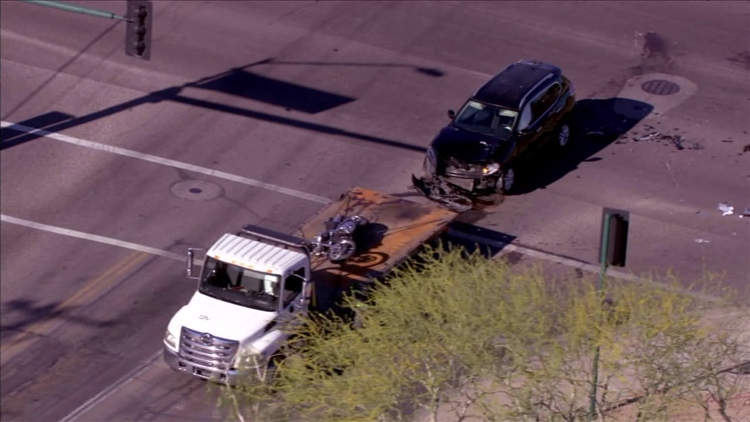 At least 1 person injured after crash in north Phoenix