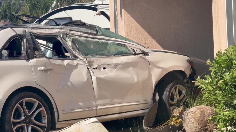 Woman crashes car through fence and into Fresno County home, police say