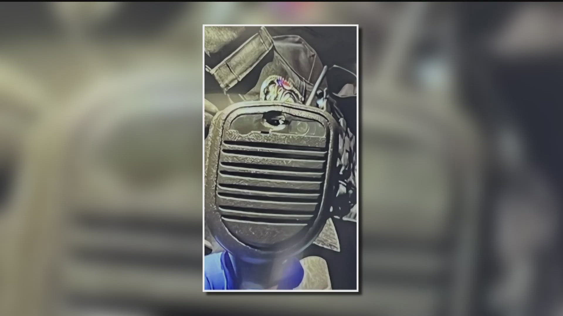 Bullet hits police officer's radio; suspect killed in standoff