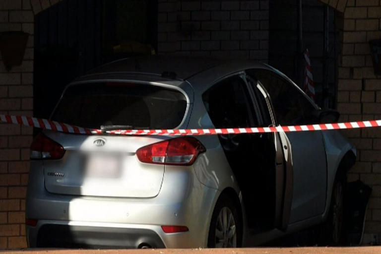 A woman has died after a car crashed into a home on the Gold Coast.