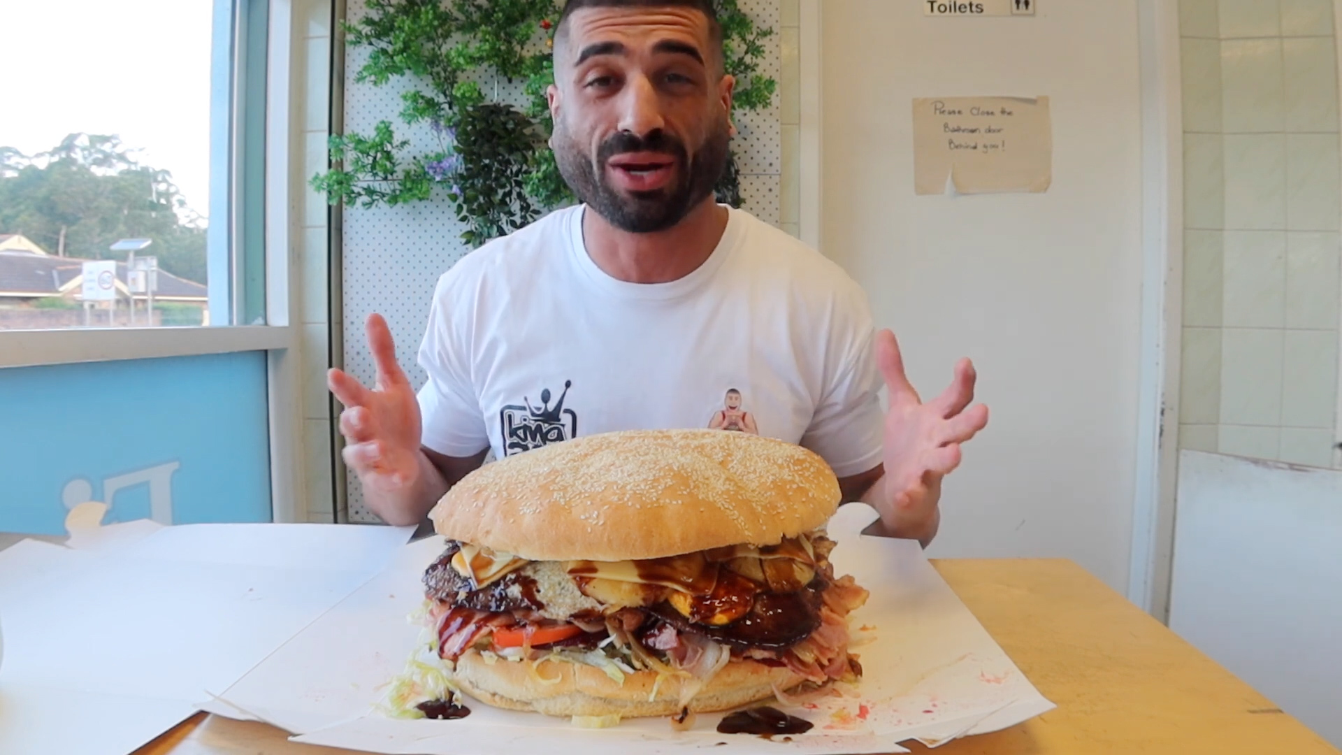 Competitive eater tries to become the first person to beat this burger ...
