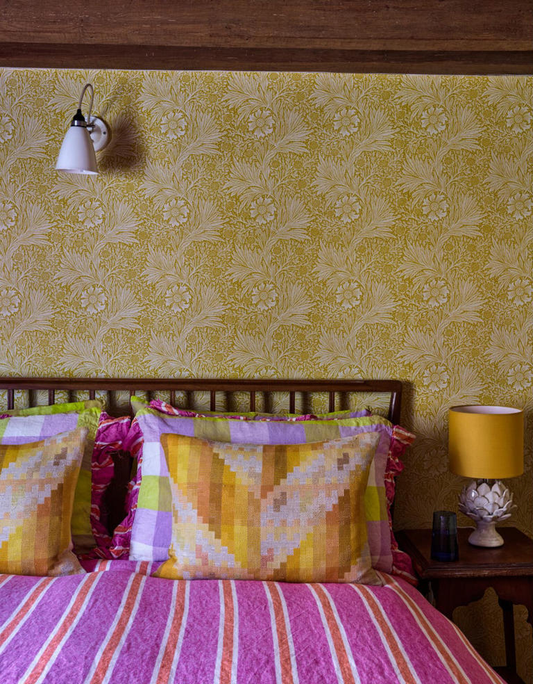 This maximalist one-bedroom cottage is full of small space ideas to steal