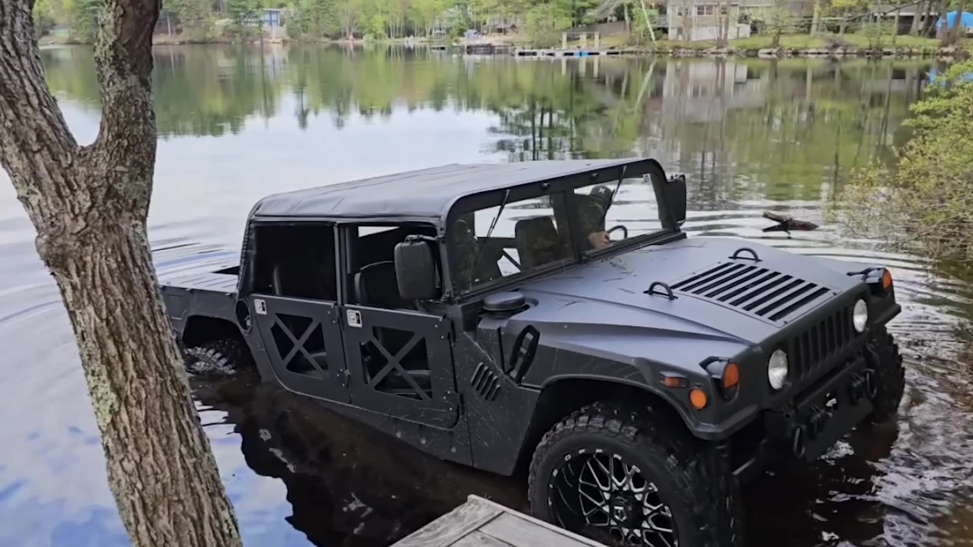 Epic tug of war showdown between a military Humvee and the Tesla Cybertruck