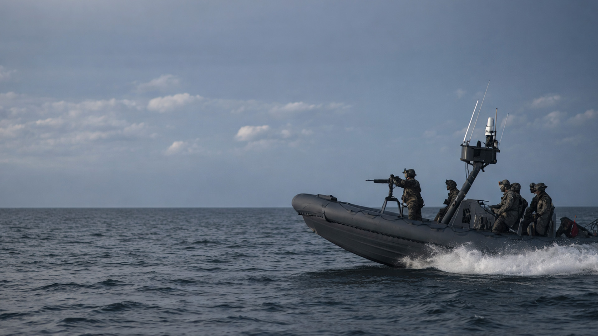 US Coast Guard practices live fire and boat raids