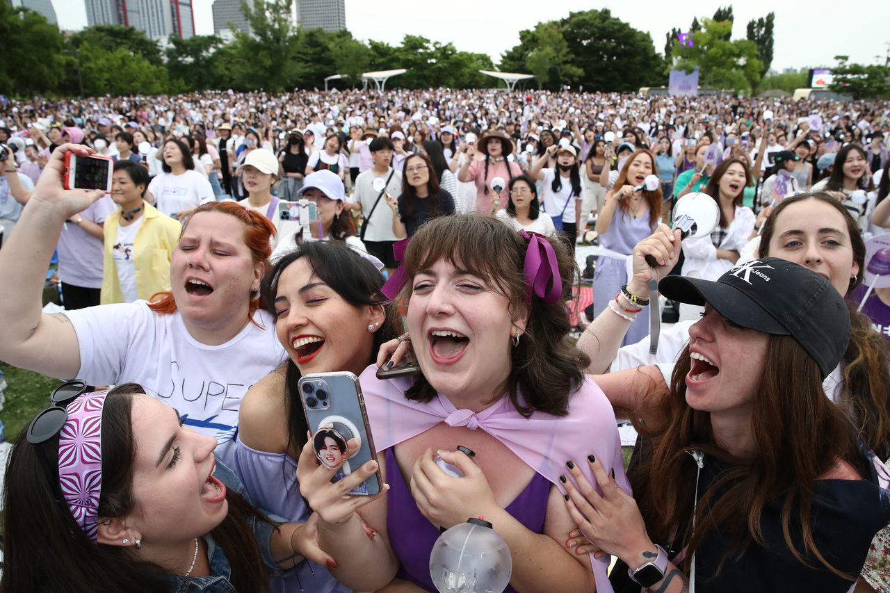 Fans of K-pop boy band BTS gather at the Yeouido park during the 'BTS Festa' on June 17, 2023