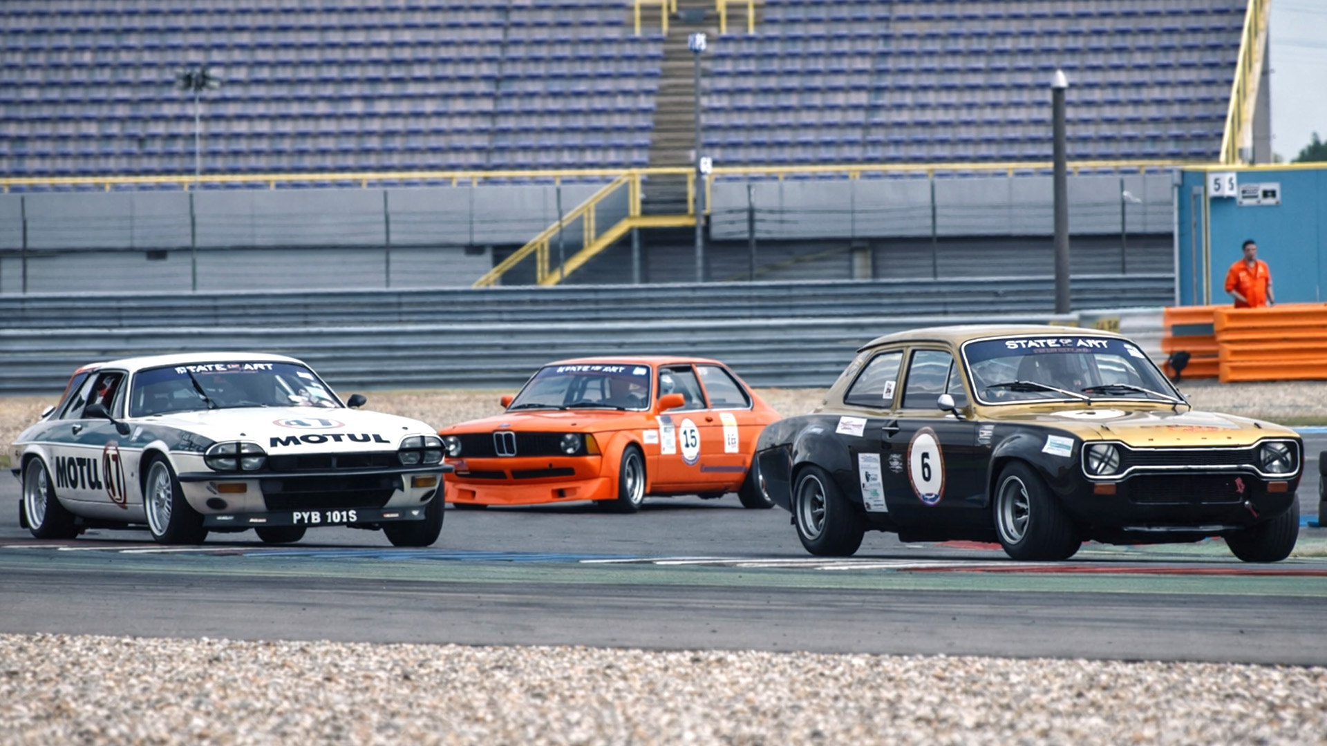 Iconic cars from different eras race together