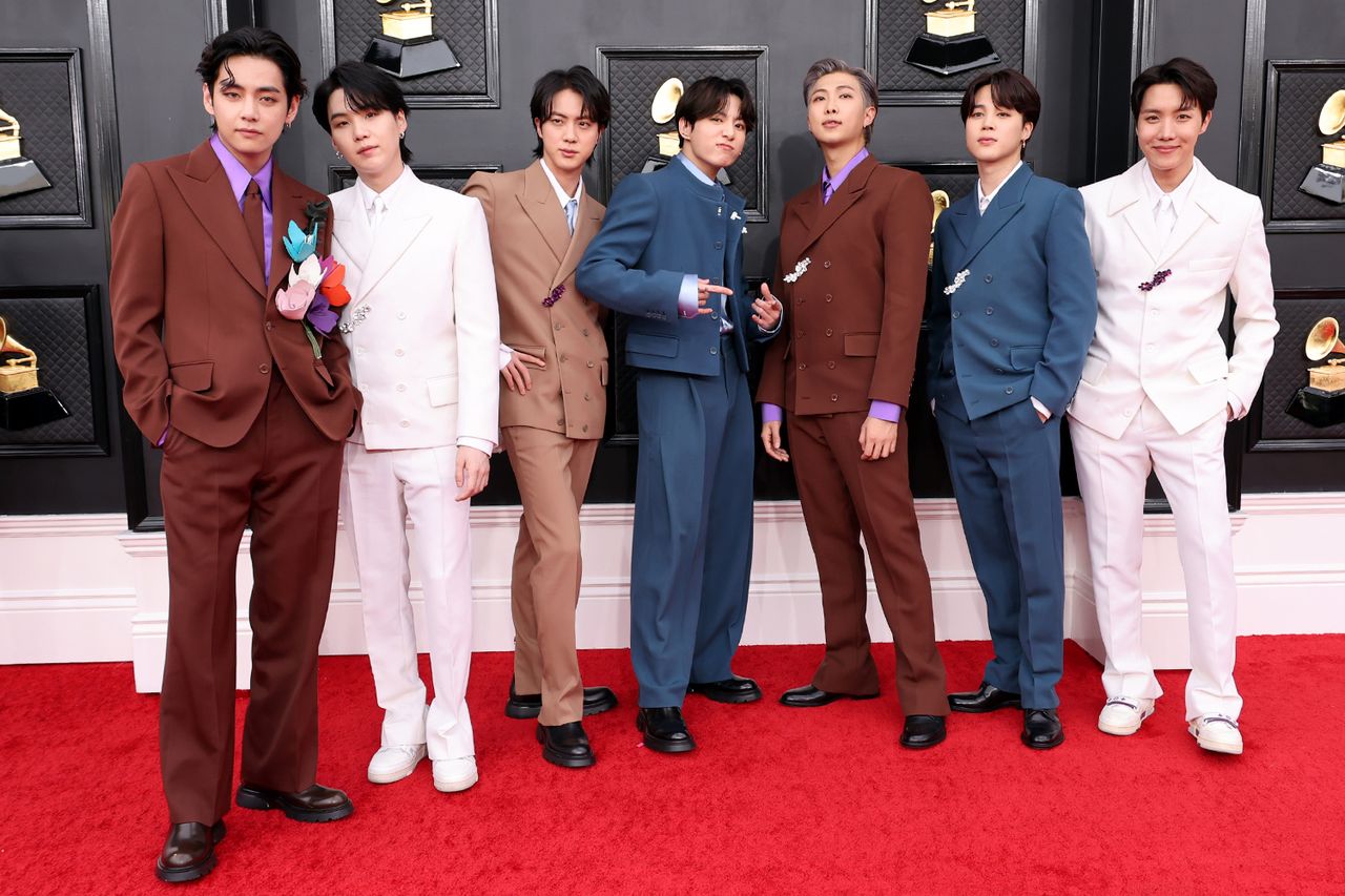 (L-R) V, Suga, Jin, Jungkook, RM, Jimin and J-Hope of BTS attend the 64th Annual GRAMMY Awards at MGM Grand Garden Arena on April 03, 2022 in Las Vegas, Nevada.