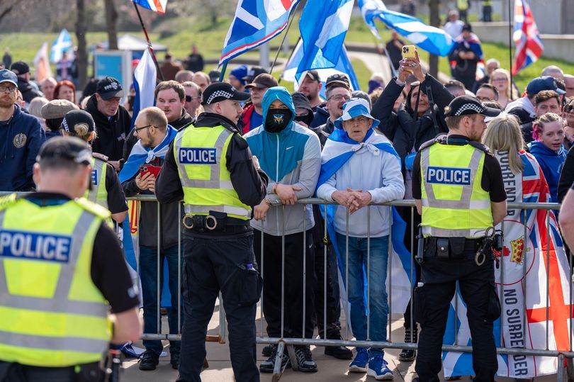 Edinburgh protestors exchange angry taunts as police separate groups at ...