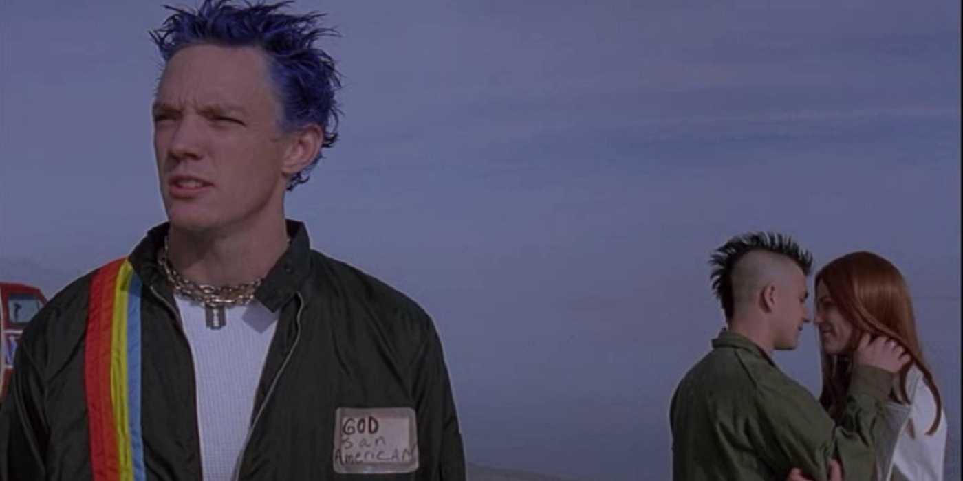 Stevo looks on while Bob kisses his girlfriend from SLC Punk!