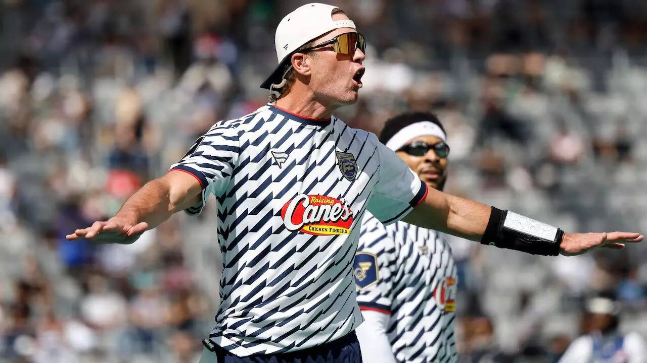 Tom Brady drops mysterious hint about football return following viral  touchdown moment at Fanatics flag football event