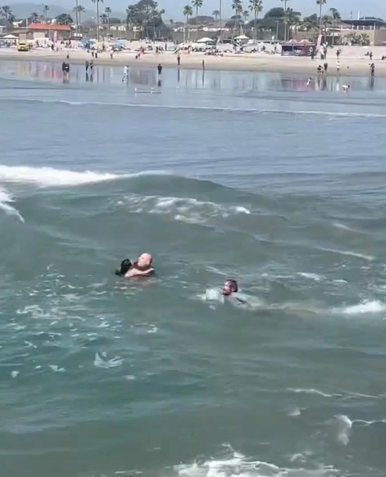 Dramatic video shows hero surf instructor rescue drowning girl