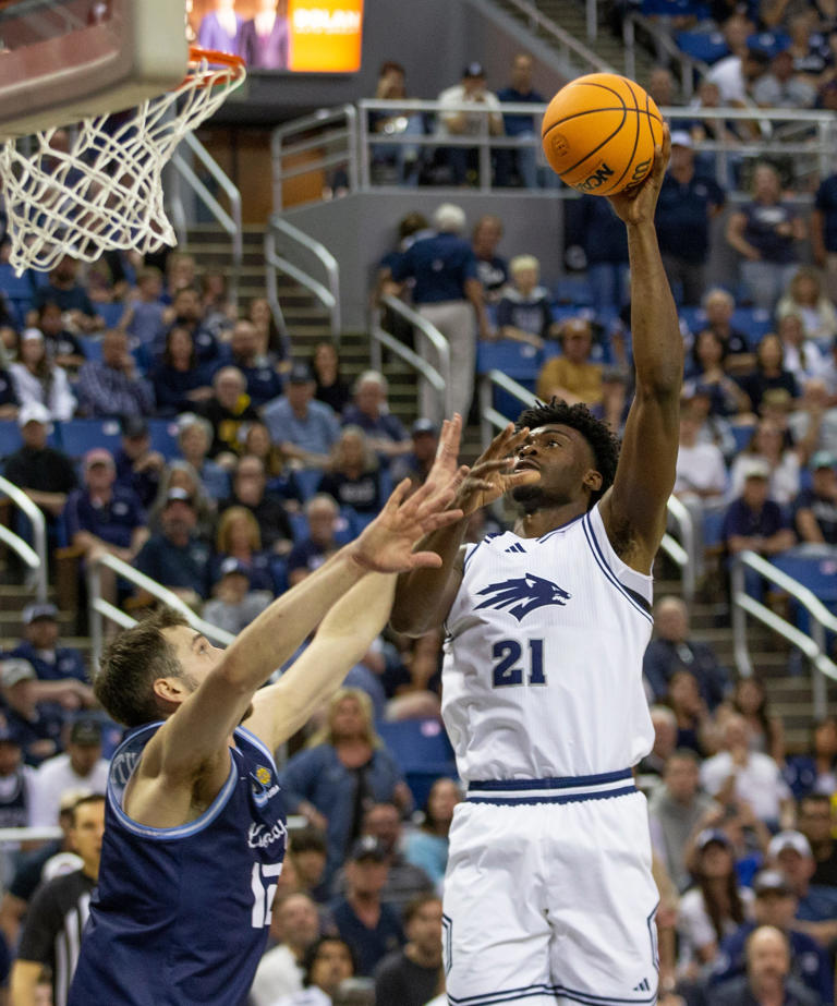 Furious rally lifts Nevada past Liberty 73-63 in NIT second round