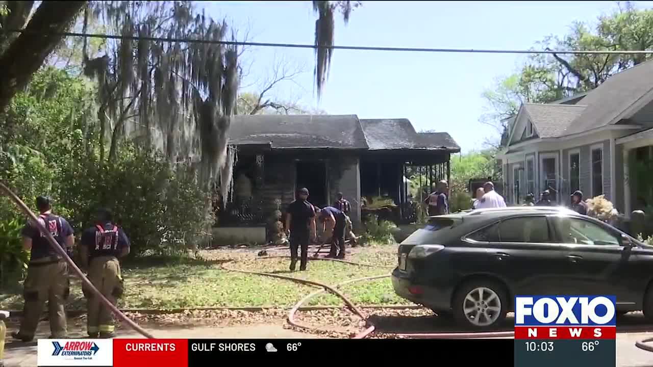 Fire crews respond to burning home on Park Avenue