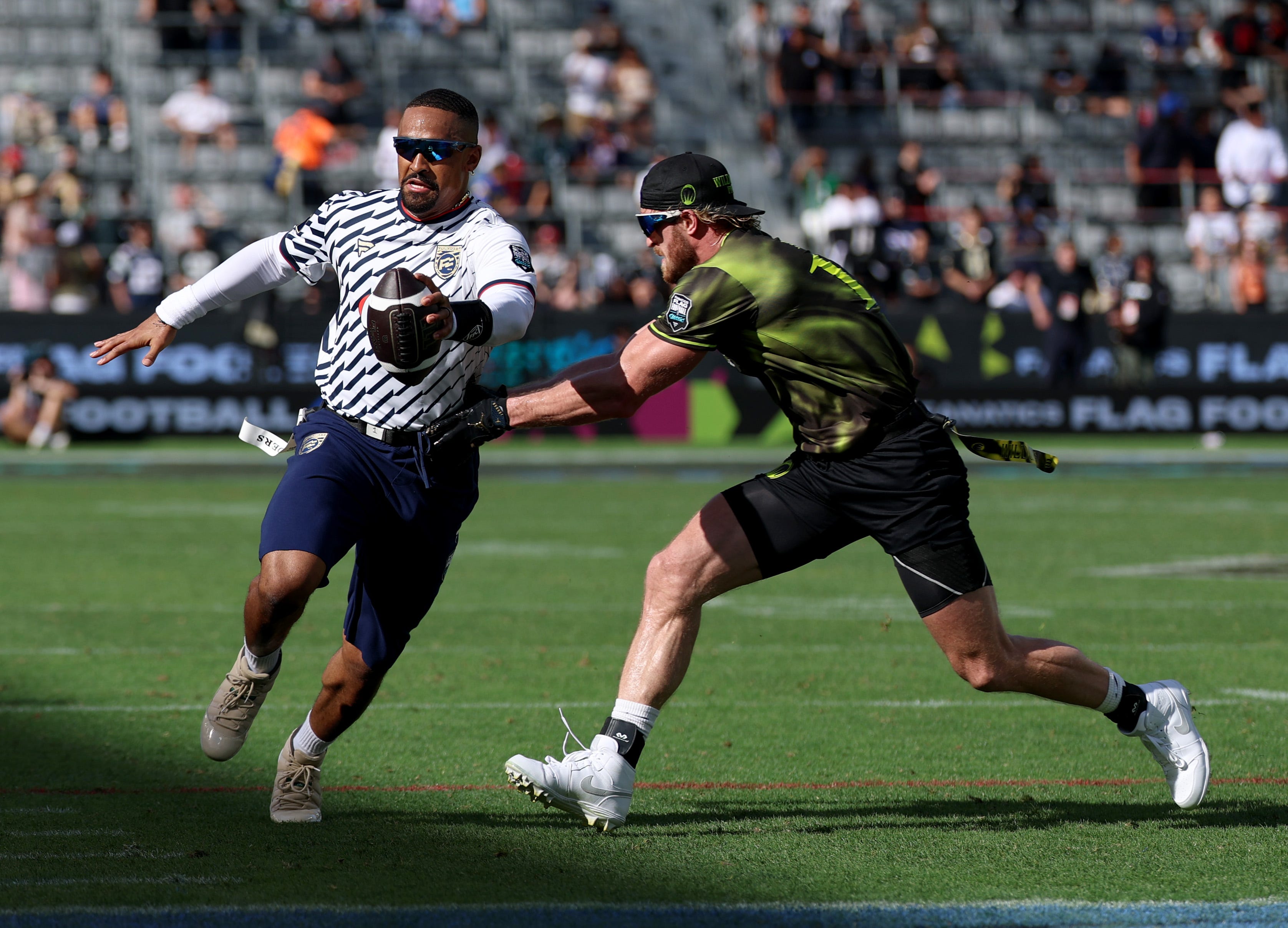 Logan Paul sacks Jalen Hurts at Fanatics Flag Football Classic