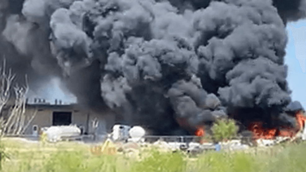 Crews battle massive fire involving 3 semi-trailers; 400 gallons of ...