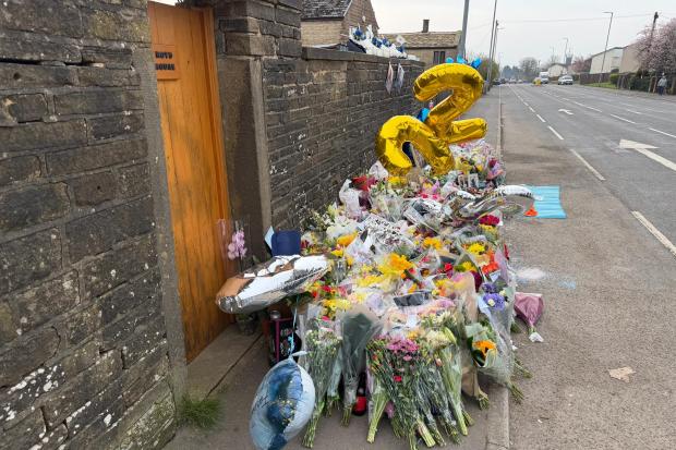 Roadside memorial to three young men grows following fatal crash in ...