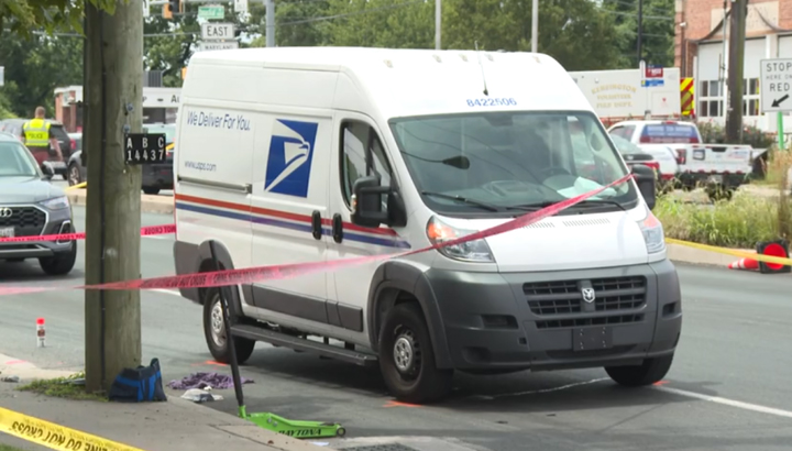 A postal worker hit a woman with his van. He’s now charged in her death.