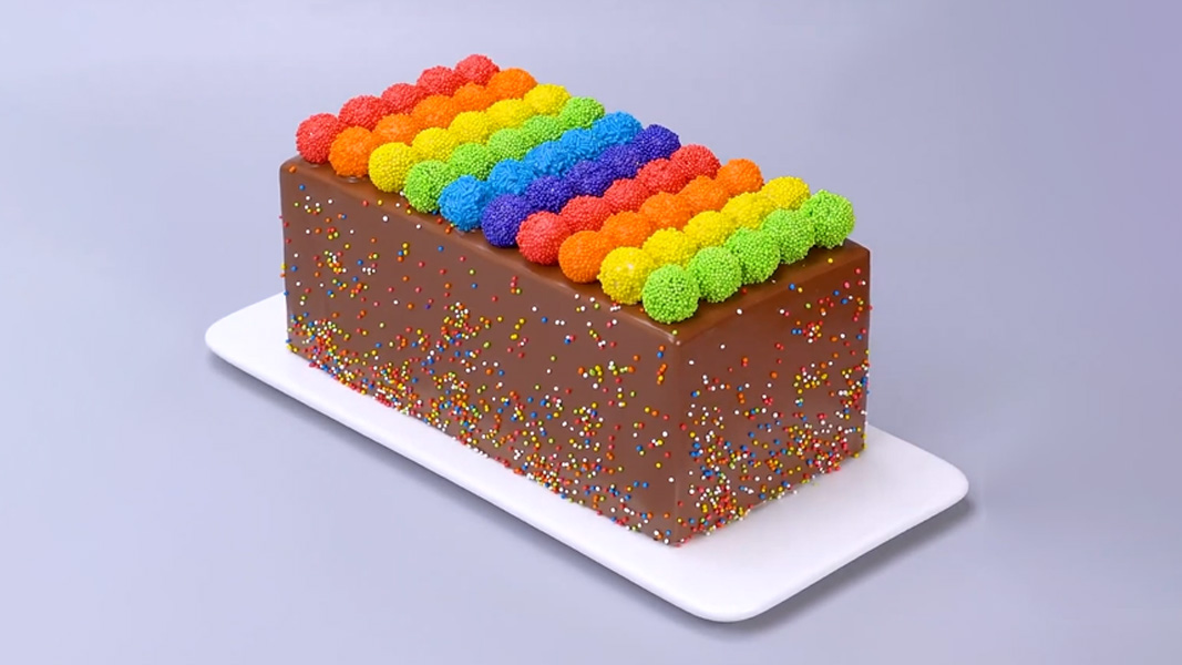 Chocolate cake with rainbow candy topping