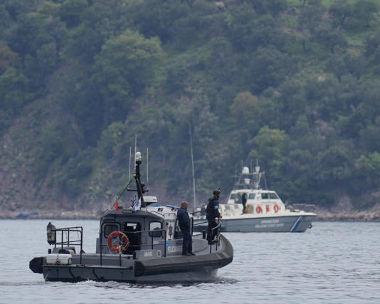 Greek coastguard vessels take part in a search and rescue operation after a boat capsized carrying people trying to reach Europe last year. Photograph: Panagiotis Balaskas/AP