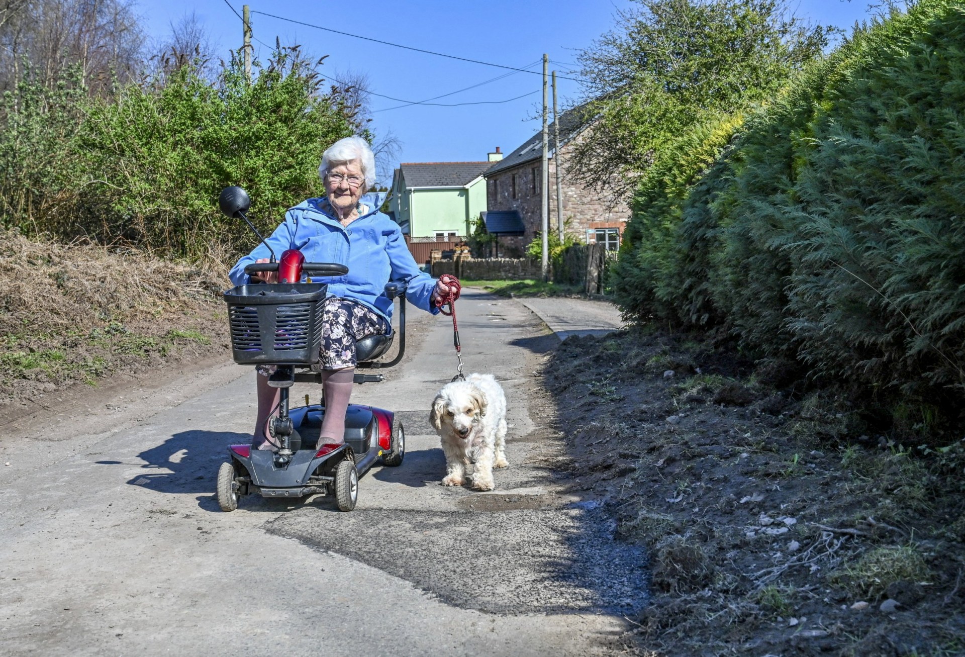 Pensioner overturns and ends up trapped under scooter after hitting pothole