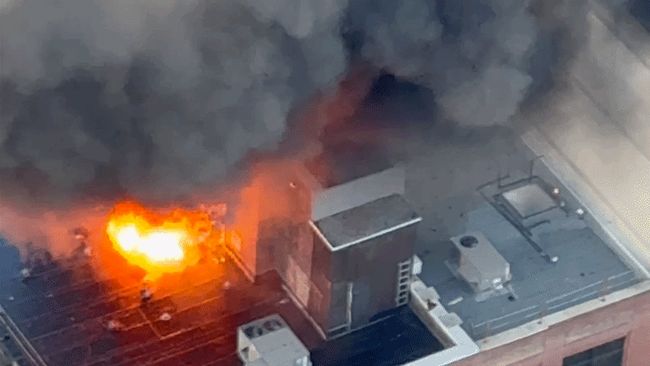 Rooftop fire causes explosions in downtown Toronto