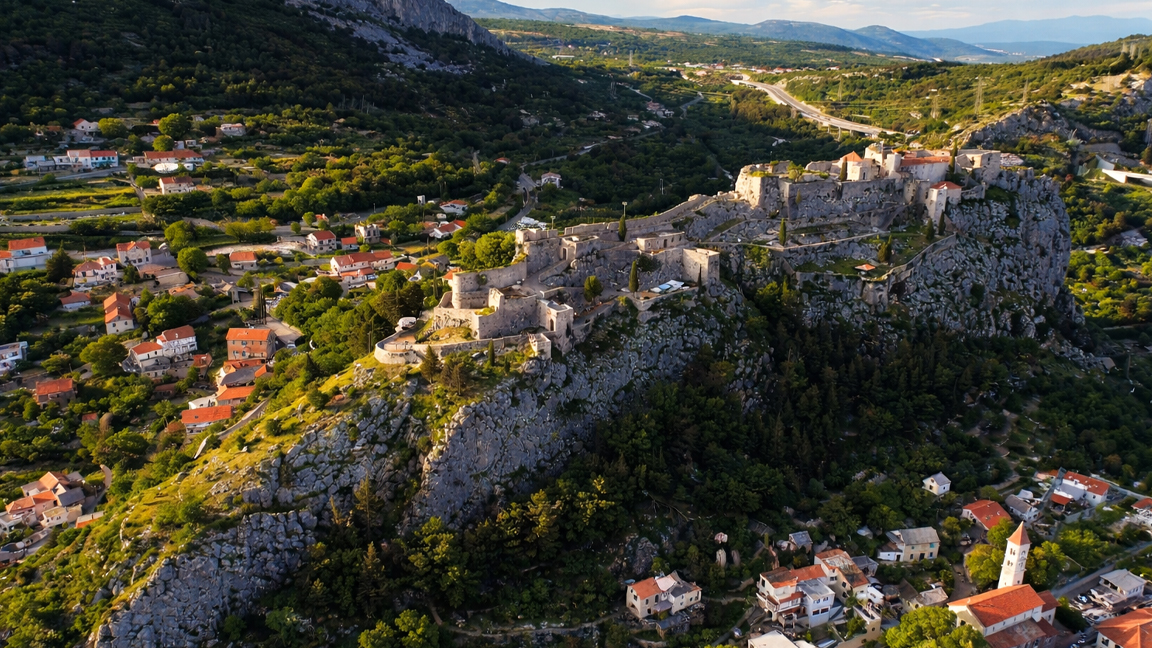 Historic fortress watching over a peaceful village below