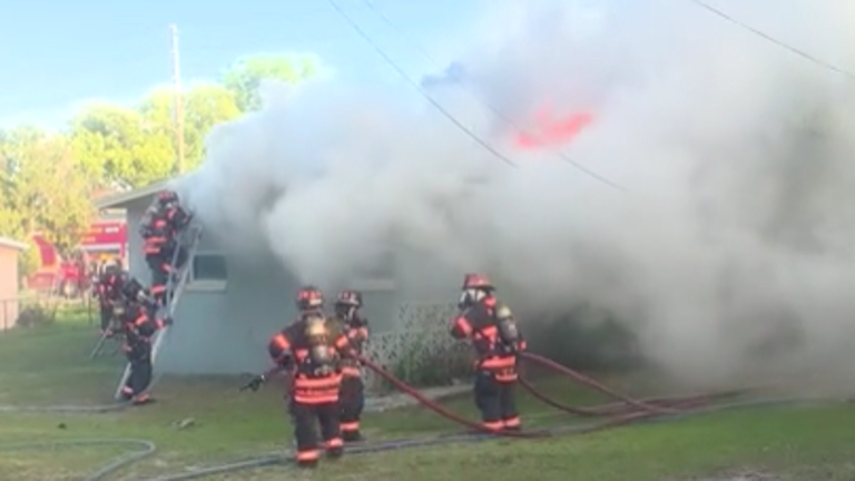 2 killed after car crashes into home and sparks fire, officials say