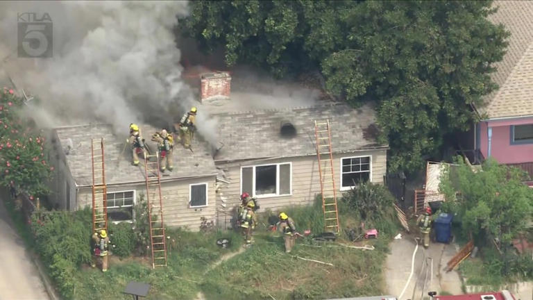 Crews battle raging house fire in East Los Angeles