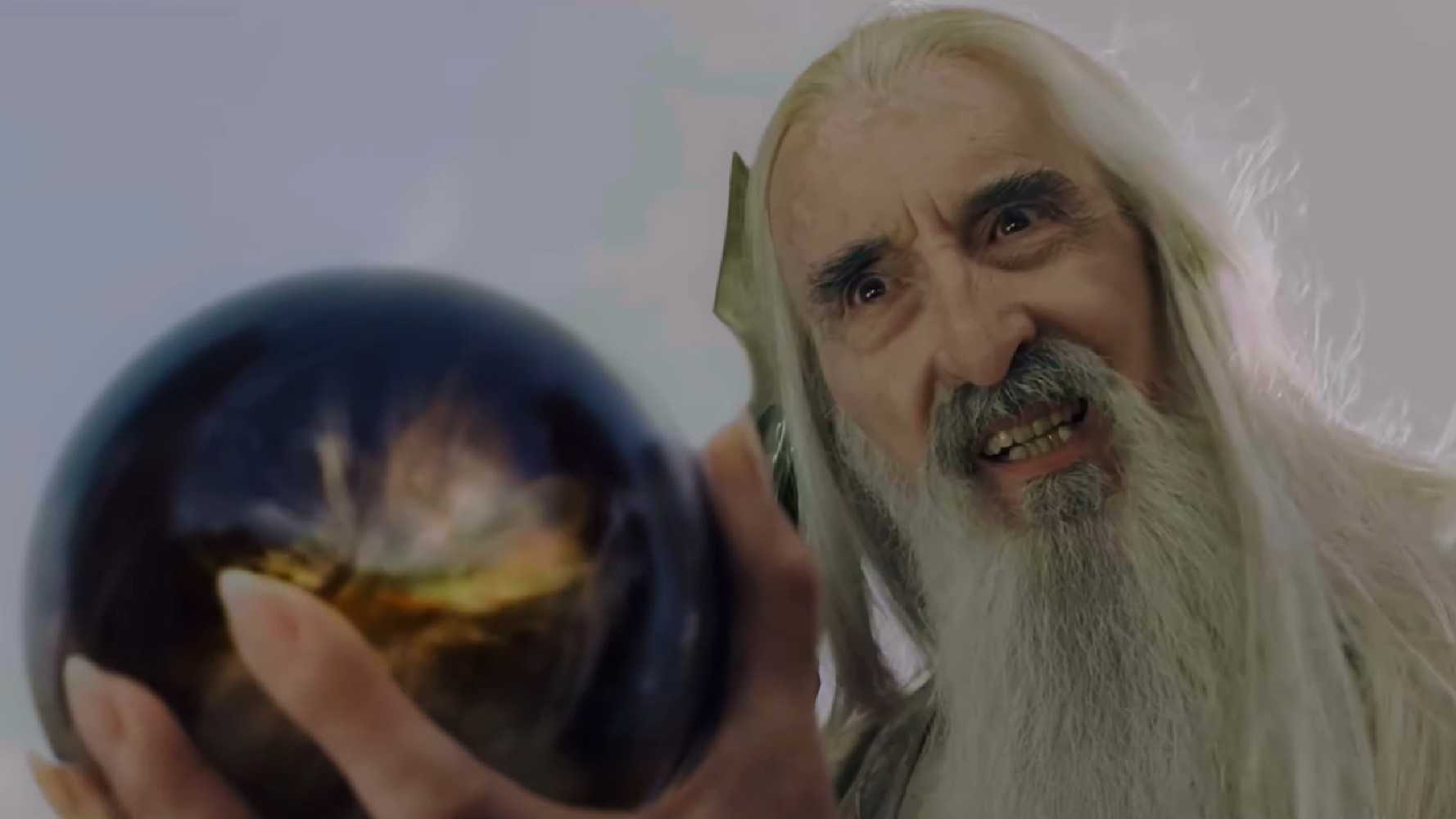 Saruman smiling as he looks into the palantir in The Lord of the Rings: The Return of the King