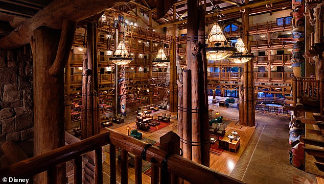 Almost everything is made from wood, there are rocking chairs that surround a cozy fireplace and even a river that runs through the lobby