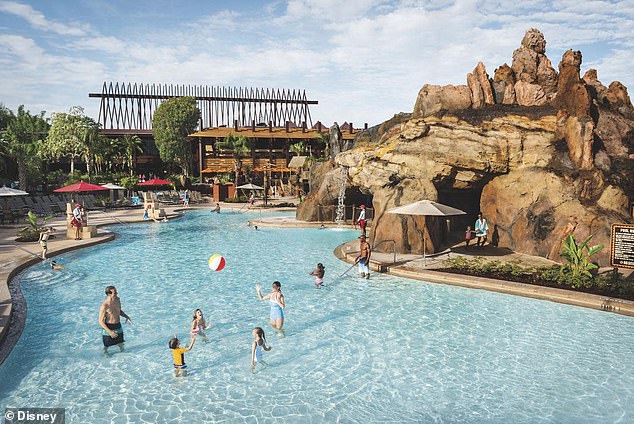 As soon as you step foot on the property cast members greet you by saying 'Aloha,' tiki torches line the pathways, and lush tropical landscaping surrounds you. One of the many pools at the Polynesian is seen