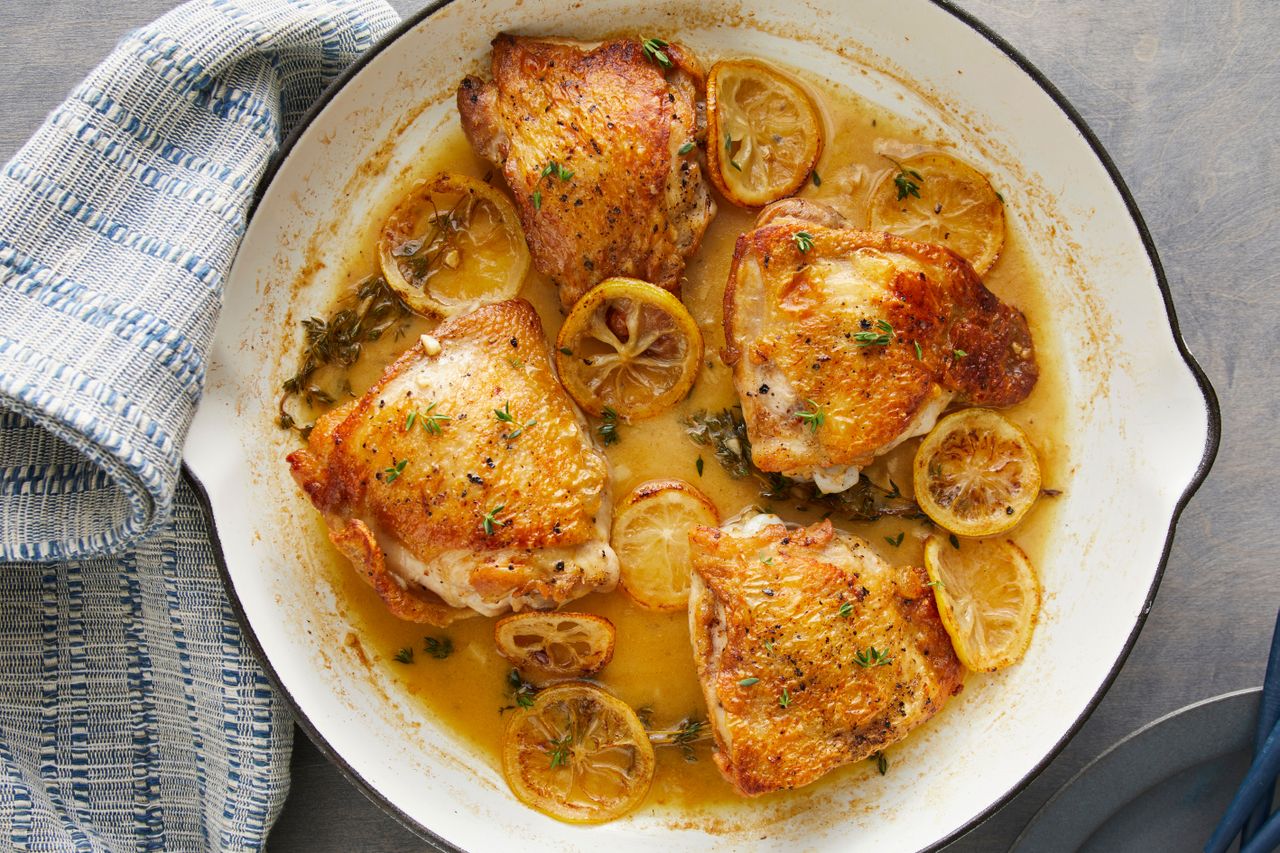 Lemon Chicken Thighs displayed on a cooking pan