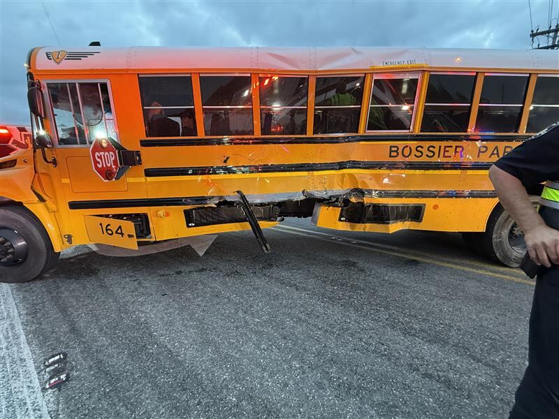 Dump truck collides with Bossier Parish school bus carrying 8 students